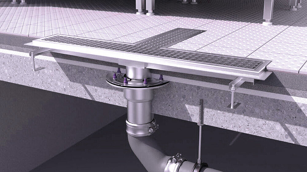 Entwässerungsrinne aus Edelstahl in einer Küche. Entwässerungsrinne aus Edelstahl in einer Küche.