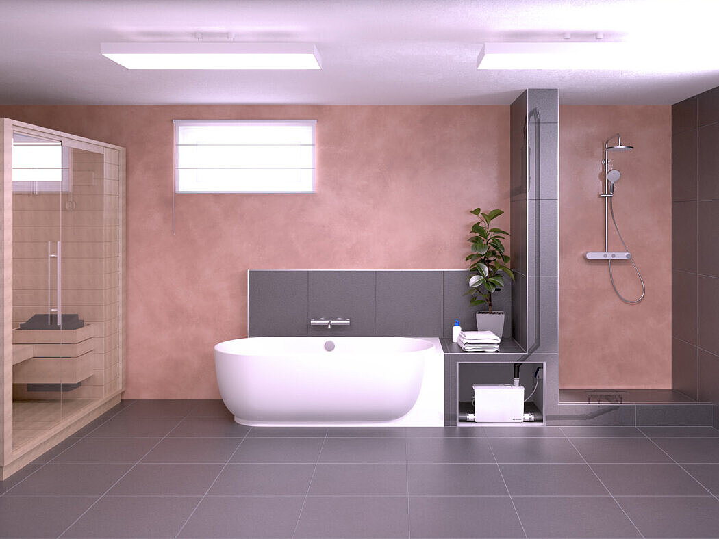 Kellerraum mit Sauna, Badewanne und Dusche. Die Entwässerungsgegenstände sind an eine Kleinhebeanlage angeschlossen.